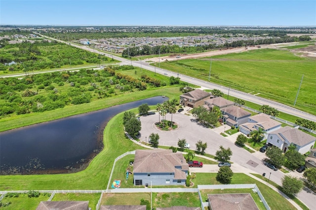 1811 Palm Warbler Ln, Ruskin, FL 33570 - aerial perspective of suburban area with a large body of water