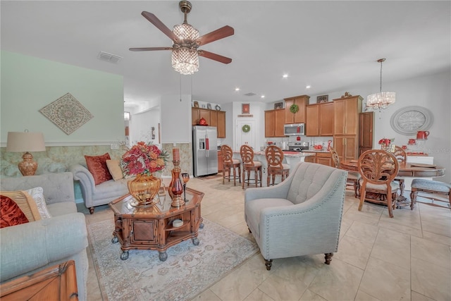 289 Siesta Vista Ct, Davenport, FL 33896 - living room featuring a ceiling fan, a chandelier, and recessed lighting
