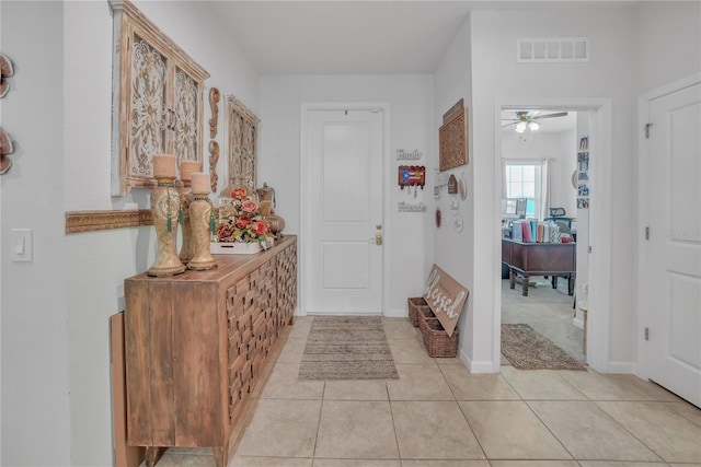 289 Siesta Vista Ct, Davenport, FL 33896 - entryway featuring light tile patterned floors and a ceiling fan