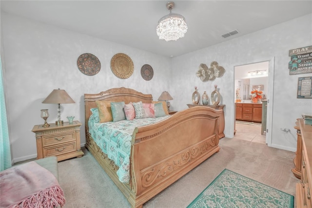 289 Siesta Vista Ct, Davenport, FL 33896 - bedroom featuring light colored carpet, a chandelier, and ensuite bathroom