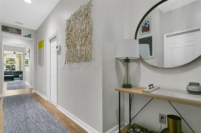 356 Irving Bend Dr, Groveland, FL 34736 - hall featuring light wood-style flooring and baseboards