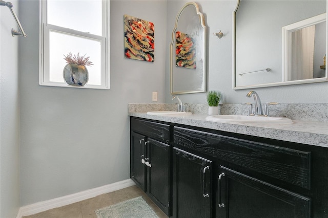 356 Irving Bend Dr, Groveland, FL 34736 - full bathroom featuring double vanity and tile patterned floors