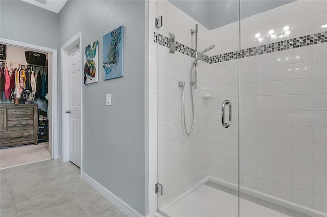 356 Irving Bend Dr, Groveland, FL 34736 - bathroom featuring a shower stall and a spacious closet