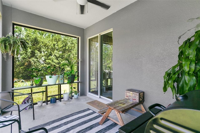 356 Irving Bend Dr, Groveland, FL 34736 - sunroom with a textured wall and carpet flooring