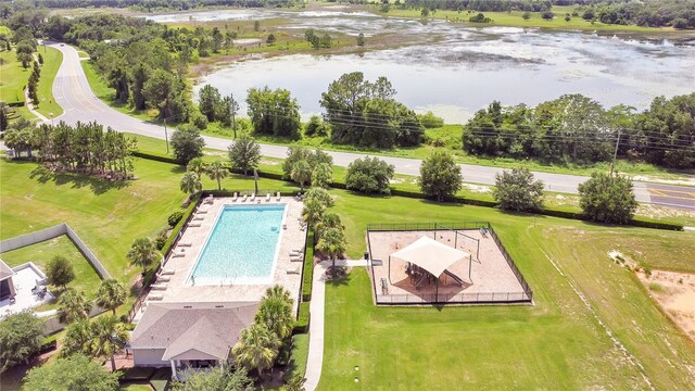 356 Irving Bend Dr, Groveland, FL 34736 - bird's eye view of a pool and a large body of water