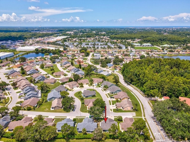 4220 Revere Cir, New Port Richey, FL 34653 - aerial overview of property's location with nearby suburban area and a nearby body of water