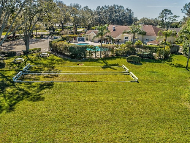4220 Revere Cir, New Port Richey, FL 34653 - view of property's community featuring a lawn