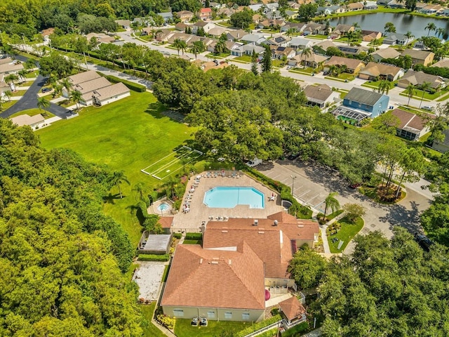 4220 Revere Cir, New Port Richey, FL 34653 - drone / aerial view of a large body of water and a pool area