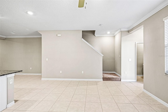 31945 Blue Passing Loop, Wesley Chapel, FL 33545 - unfurnished living room with ornamental molding, a ceiling fan, a textured ceiling, light tile patterned floors, and recessed lighting