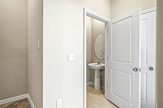 31945 Blue Passing Loop, Wesley Chapel, FL 33545 - bathroom with tile patterned flooring and baseboards