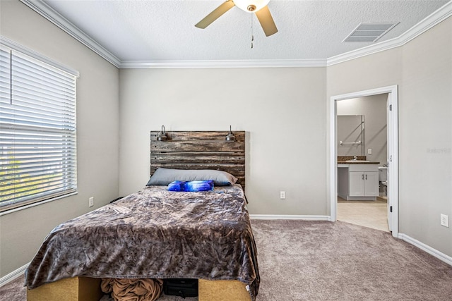 31945 Blue Passing Loop, Wesley Chapel, FL 33545 - carpeted bedroom featuring ornamental molding, a textured ceiling, ensuite bathroom, and a ceiling fan