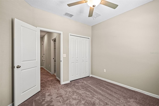 31945 Blue Passing Loop, Wesley Chapel, FL 33545 - unfurnished bedroom featuring carpet, a closet, and ceiling fan