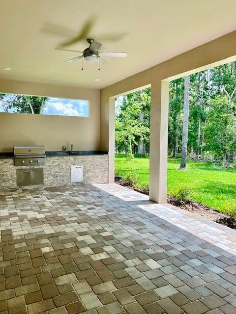 4800 Hickory Oak Dr, Brooksville, FL 34601 - view of patio featuring area for grilling and ceiling fan