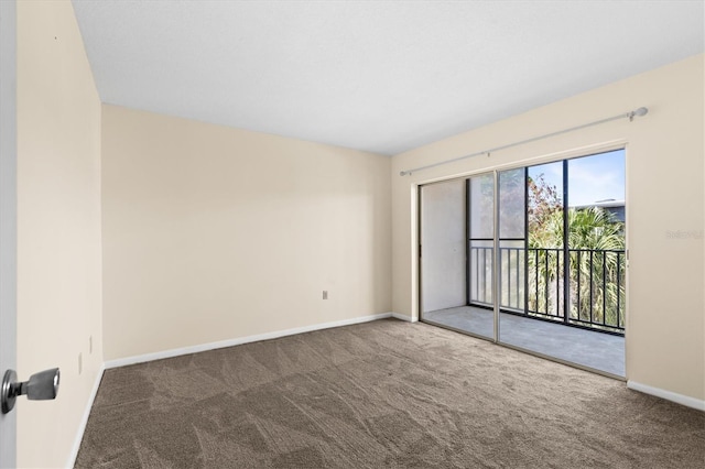 840 Virginia St Unit 301, Dunedin, FL 34698 - carpeted spare room with baseboards