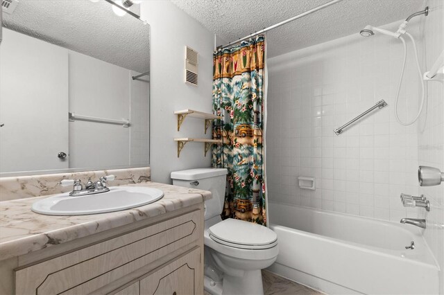 840 Virginia St Unit 301, Dunedin, FL 34698 - full bathroom with a textured ceiling, shower / tub combo, and vanity
