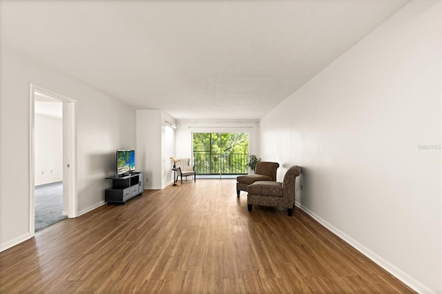 840 Virginia St Unit 301, Dunedin, FL 34698 - sitting room with wood finished floors