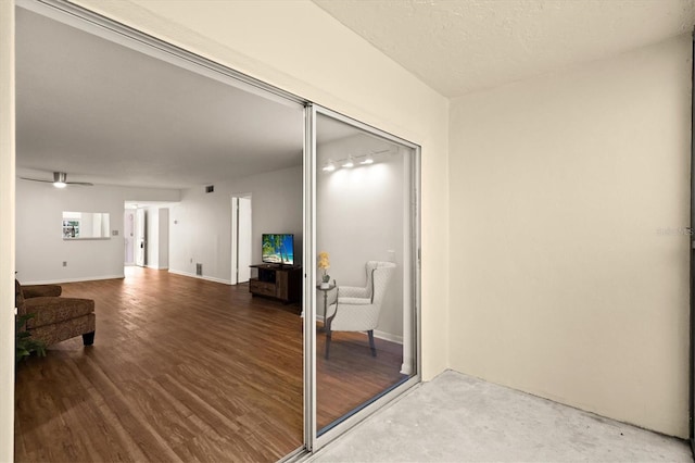 840 Virginia St Unit 301, Dunedin, FL 34698 - corridor with baseboards and wood finished floors