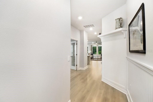 11809 Catawba Cv, Parrish, FL 34219 - hallway with light wood finished floors and recessed lighting