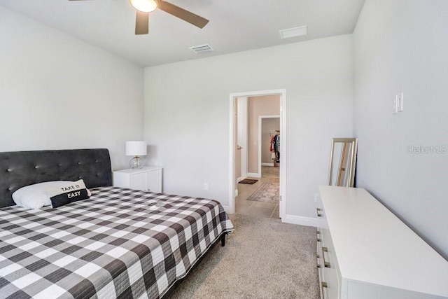11809 Catawba Cv, Parrish, FL 34219 - bedroom featuring light carpet and a ceiling fan