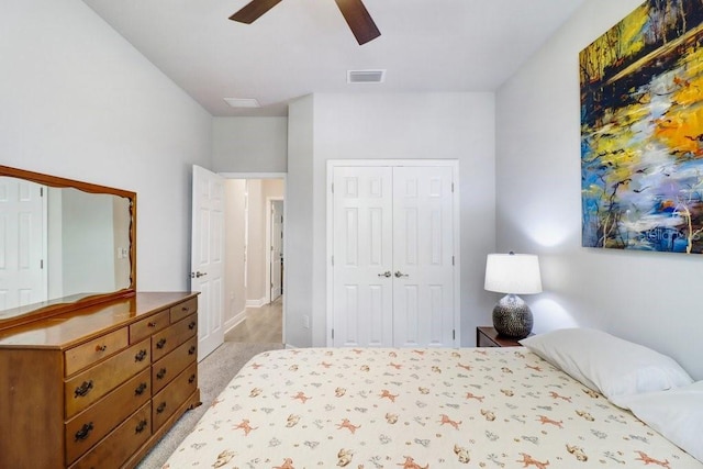 11809 Catawba Cv, Parrish, FL 34219 - bedroom featuring light carpet, a closet, and ceiling fan