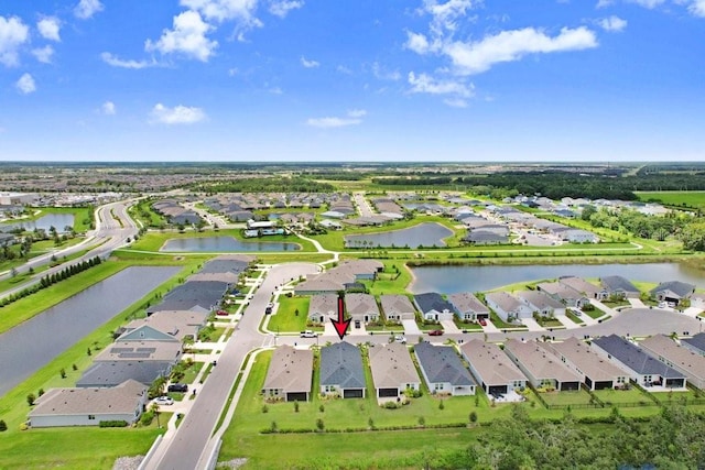 11809 Catawba Cv, Parrish, FL 34219 - aerial perspective of suburban area with a large body of water