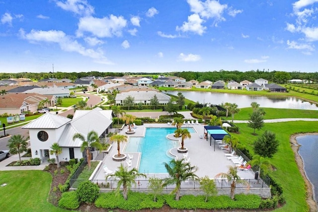 11809 Catawba Cv, Parrish, FL 34219 - aerial view of residential area featuring a pool and a nearby body of water