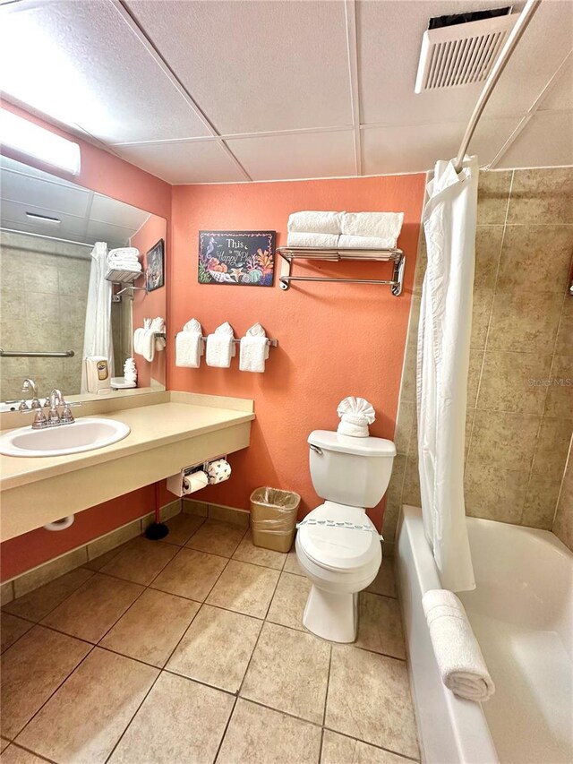 445 S Gulfview Blvd Unit 421, Clearwater Beach, FL 33767 - bathroom with tile patterned floors, shower / bath combo, and vanity