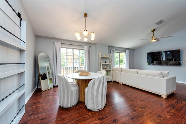 7001 Interbay Blvd Unit 121, Tampa, FL 33616 - dining space with dark wood-style flooring, a chandelier, a ceiling fan, and vaulted ceiling