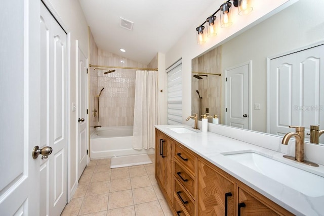 7001 Interbay Blvd Unit 121, Tampa, FL 33616 - bathroom featuring double vanity, shower / tub combo, tile patterned flooring, and vaulted ceiling