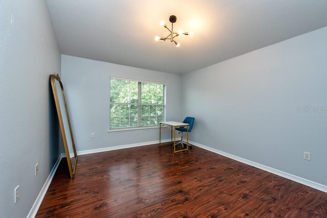 7001 Interbay Blvd Unit 121, Tampa, FL 33616 - empty room with a chandelier and wood finished floors