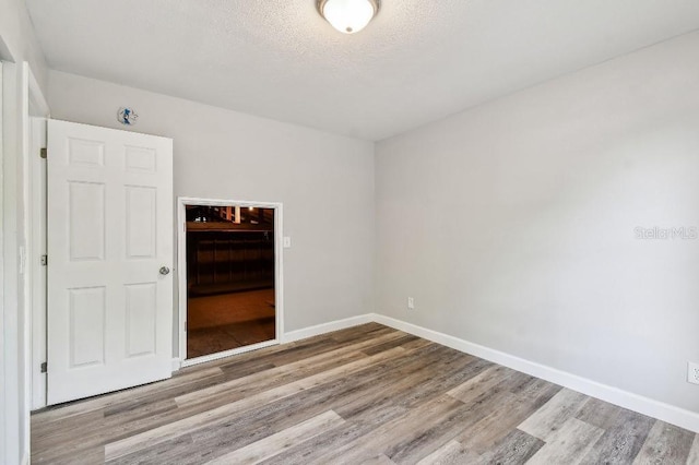 38323 11th Ave, Zephyrhills, FL 33542 - unfurnished room with wood finished floors