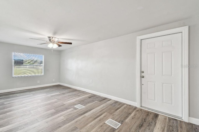 38323 11th Ave, Zephyrhills, FL 33542 - spare room featuring a ceiling fan and wood finished floors