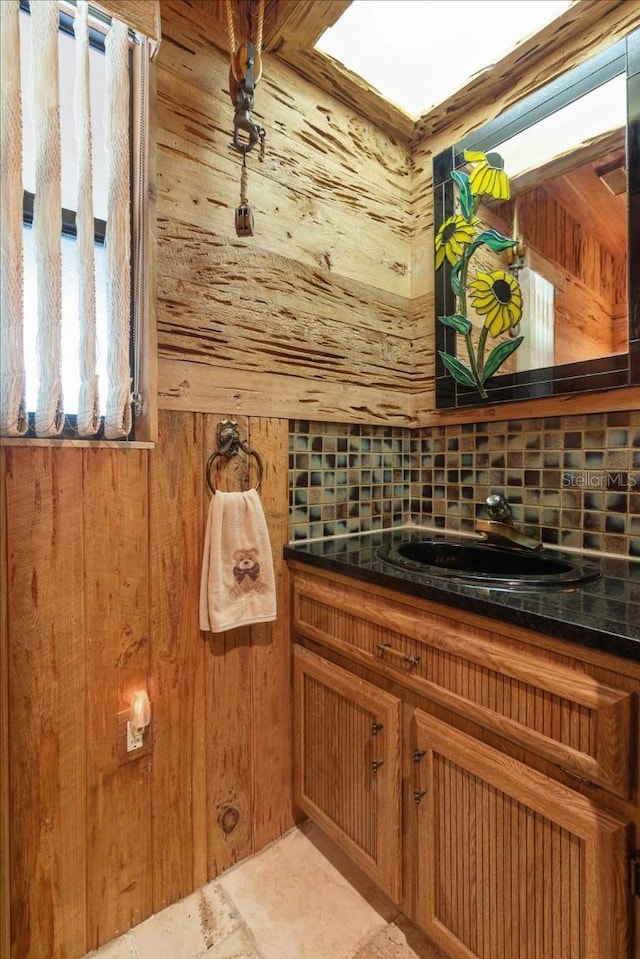 935 Ranch Rd, Tarpon Springs, FL 34688 - bathroom with vanity and wood walls