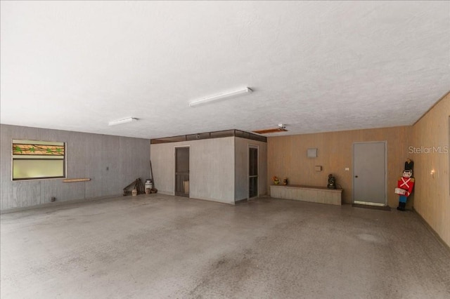 935 Ranch Rd, Tarpon Springs, FL 34688 - garage featuring wood walls