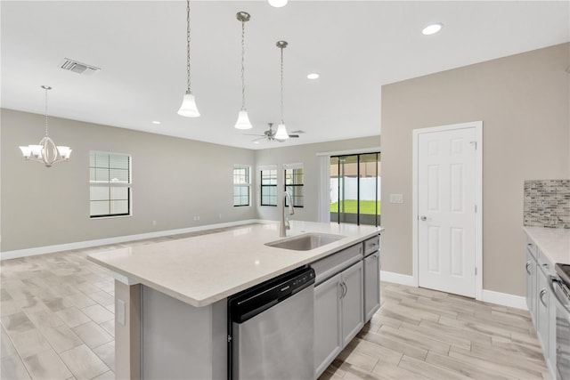 12828 Satin Lily Dr, Riverview, FL 33579 - kitchen featuring dishwasher, recessed lighting, a ceiling fan, hanging light fixtures, and a chandelier