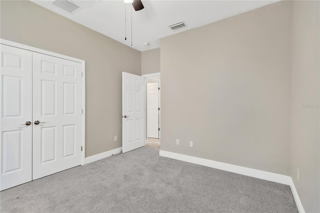 12828 Satin Lily Dr, Riverview, FL 33579 - unfurnished bedroom featuring carpet floors, ceiling fan, and a closet