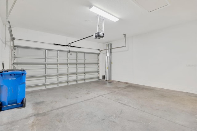 12828 Satin Lily Dr, Riverview, FL 33579 - garage featuring a garage door opener