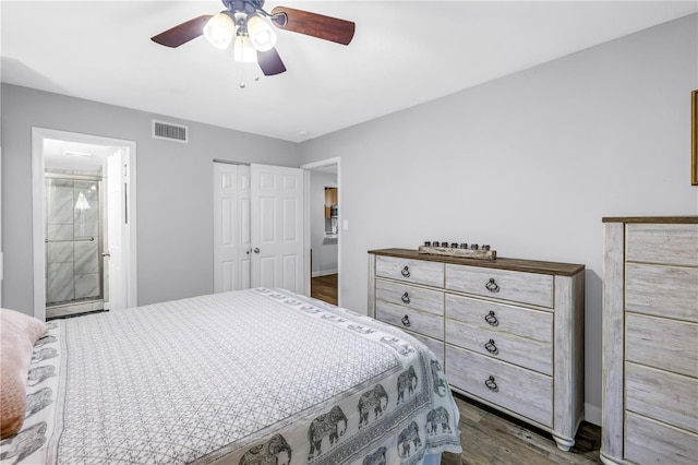 1918 Pelican Landing Blvd Unit 1112, Clearwater, FL 33762 - bedroom featuring dark wood-style floors, a closet, and ceiling fan