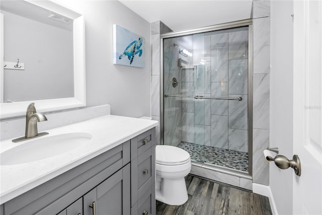 1918 Pelican Landing Blvd Unit 1112, Clearwater, FL 33762 - full bath with vanity, a stall shower, and wood finished floors