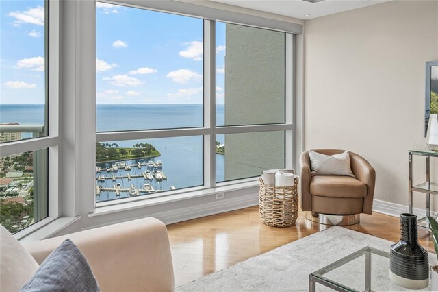 400 Beach Dr NE Unit 2301, Saint Petersburg, FL 33701 - living area with a water view and wood finished floors