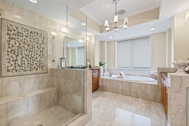 400 Beach Dr NE Unit 2301, Saint Petersburg, FL 33701 - bathroom with vanity, a garden tub, a stall shower, a chandelier, and marble finish floors