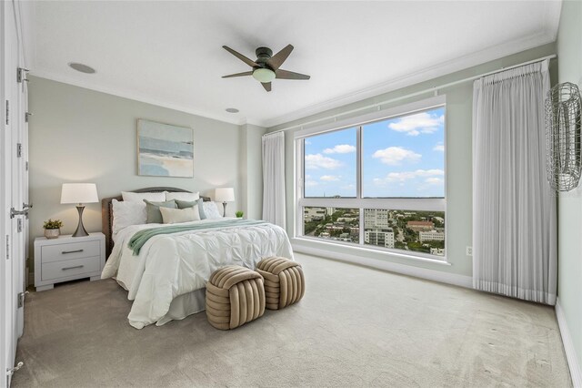 400 Beach Dr NE Unit 2301, Saint Petersburg, FL 33701 - bedroom with carpet, crown molding, and a ceiling fan