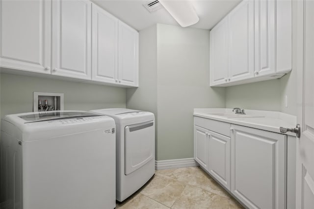 400 Beach Dr NE Unit 2301, Saint Petersburg, FL 33701 - washroom featuring independent washer and dryer and cabinet space