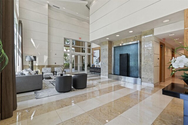 400 Beach Dr NE Unit 2301, Saint Petersburg, FL 33701 - community lobby with a high ceiling and recessed lighting