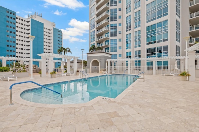 400 Beach Dr NE Unit 2301, Saint Petersburg, FL 33701 - community pool featuring a patio and a pergola