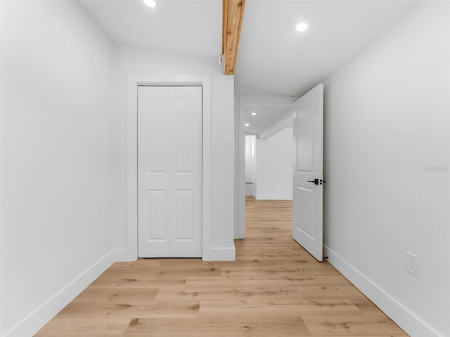 960 65th St S, Saint Petersburg, FL 33707 - unfurnished bedroom featuring recessed lighting, a closet, light wood-style floors, and lofted ceiling