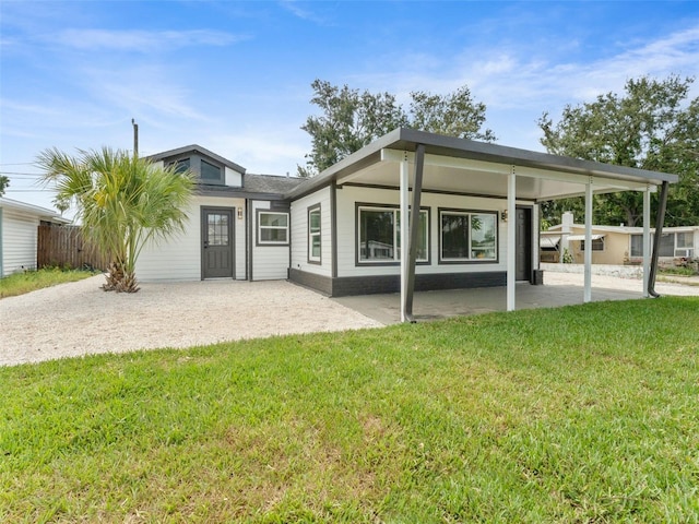 960 65th St S, Saint Petersburg, FL 33707 - back of property featuring a patio