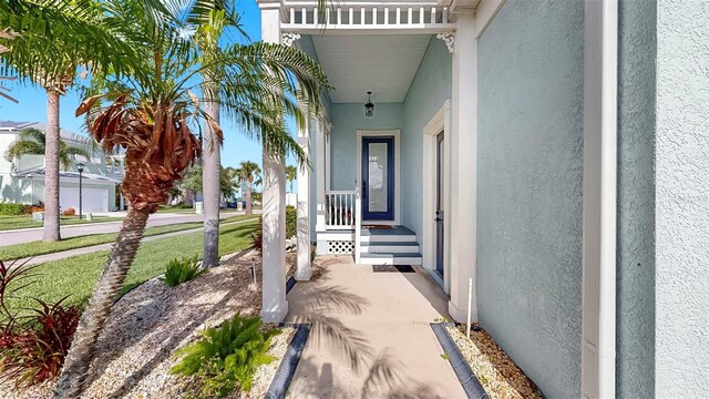 6545 Simone Shores Cir, Apollo Beach, FL 33572 - view of exterior entry with stucco siding