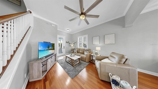 6545 Simone Shores Cir, Apollo Beach, FL 33572 - living area with ornamental molding, ceiling fan, and wood finished floors