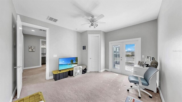 6545 Simone Shores Cir, Apollo Beach, FL 33572 - sitting room featuring french doors, carpet floors, and ceiling fan